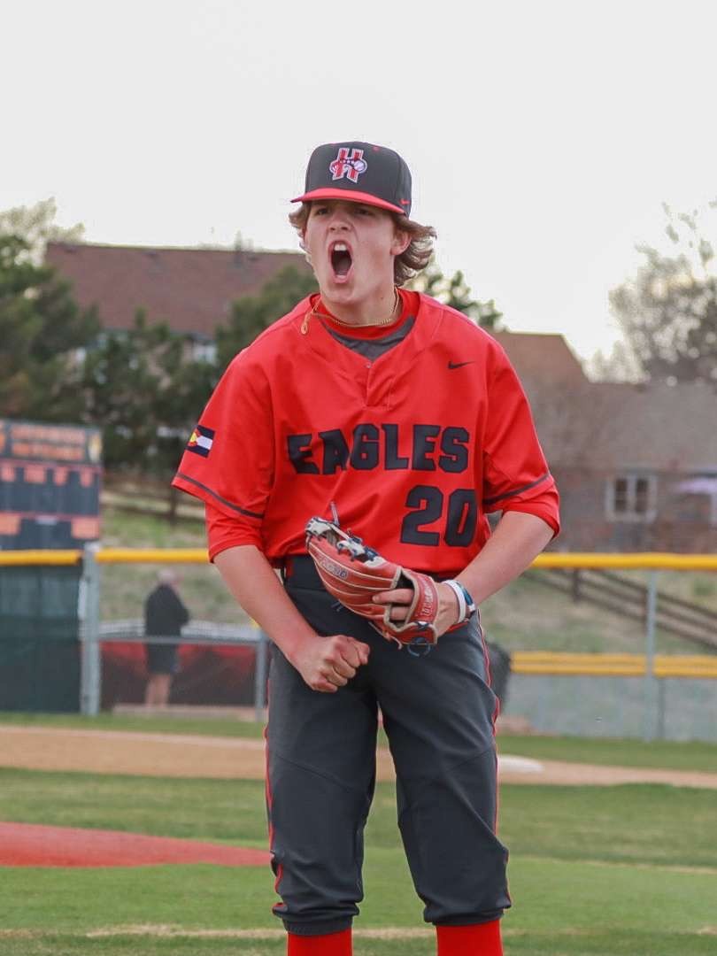 Ben pitching for his new high school team