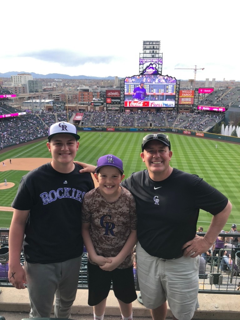 Tom and Ben at a baseball tournament